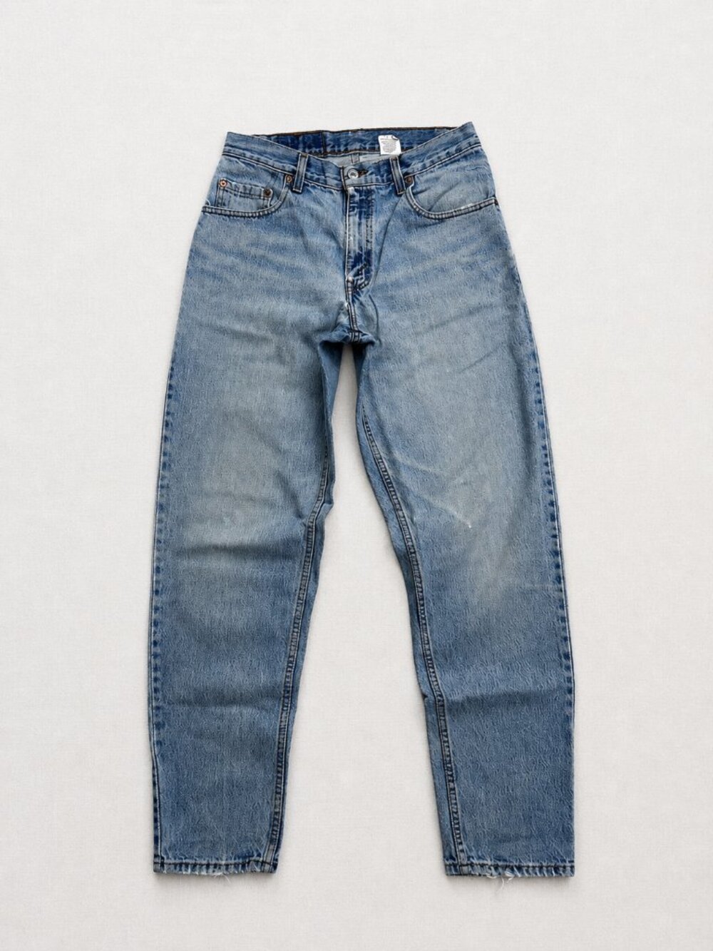 Vintage Levi's 560 Jeans Men's 29x32 Loose Fit Tapered Leg Light Wash 90s